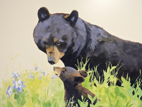 hand painted mural for Mountainland Pediatrics with birdhouses, bears, butterflies, owls, turtles, ducks, deer, fox, rabbits, flowers, mountain lion, 