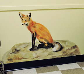 hand painted mural of a red fox by Boulder Murals, hand painted mural for Mountainland Pediatrics with birdhouses, bears, butterflies, owls, turtles, ducks, deer, fox, rabbits, flowers, mountain lion, 